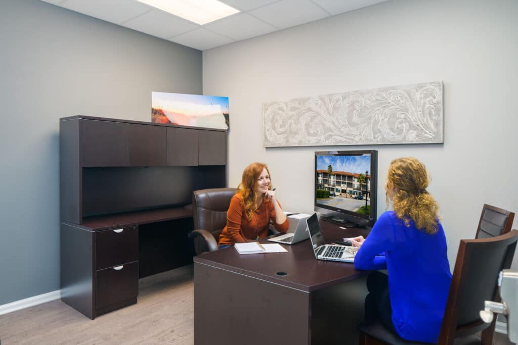 Modern private office for rent near me with ergonomic furniture and abundant natural light in a vibrant coworking space in st. augustine.